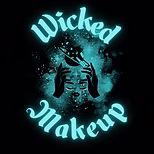 Glowing blue "Wicked Makeup" text frames an illustrated face. Two hands lift a mask above, surrounded by sparkles and abstract shapes, all set against a dark, mysterious background.
