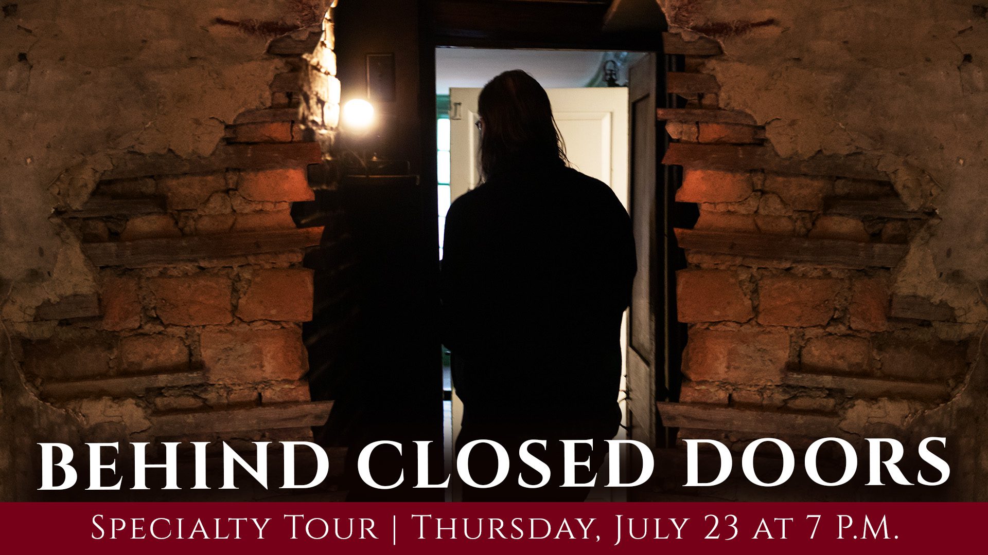 A person with long hair stands facing an open door in a dimly lit, brick-walled room. Text at the bottom reads, "BEHIND CLOSED DOORS Specialty Tour | Thursday, July 23 at 7 P.M.
