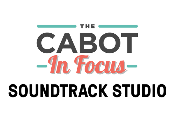 A logo with the words "The Cabot In Focus" in bold and cursive fonts above "Soundtrack Studio" in black, all on a white background.