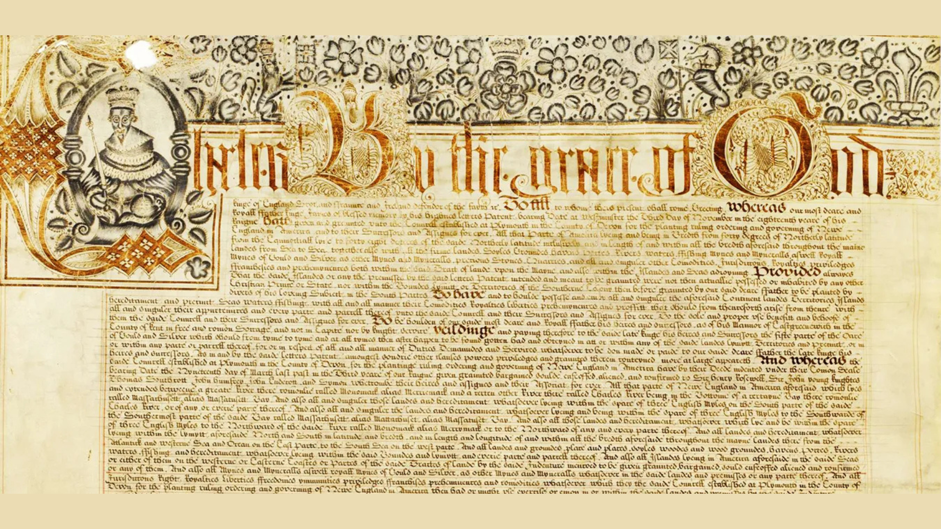 An ornate archival reproduction featuring elaborate calligraphy, gold embellishments, and a decorated letter with a portrait. Dense handwritten text fills the Massachusetts Bay Charter parchment, with decorative patterns at the top.