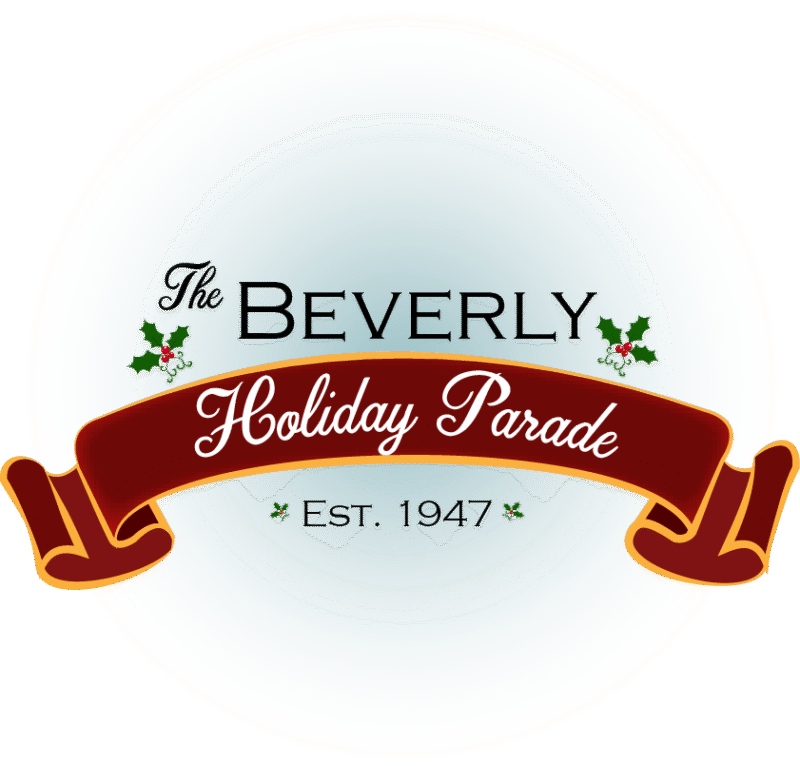 Logo for The Beverly Holiday Parade. “The Beverly” is written above a red ribbon with “Holiday Parade” in script. Below, it reads “Est. 1947.” Holly leaves decorate the design.