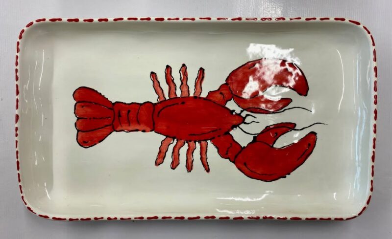 A rectangular white ceramic Lobstah Platter featuring a red lobster illustration in the center and a border of small red dots, perfect for your next Painting Night or Lobstah Painting event.