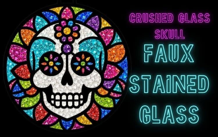 A circular stained glass-style image of a white skull with colorful floral designs. The background is black. Neon text on the right reads: “Crushed Glass Skull Faux Stained Glass.”.