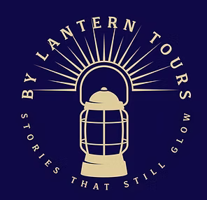 Logo for By Lantern Tours featuring a lantern icon with radiating light lines and the tagline “Stories that still glow” curved around it.